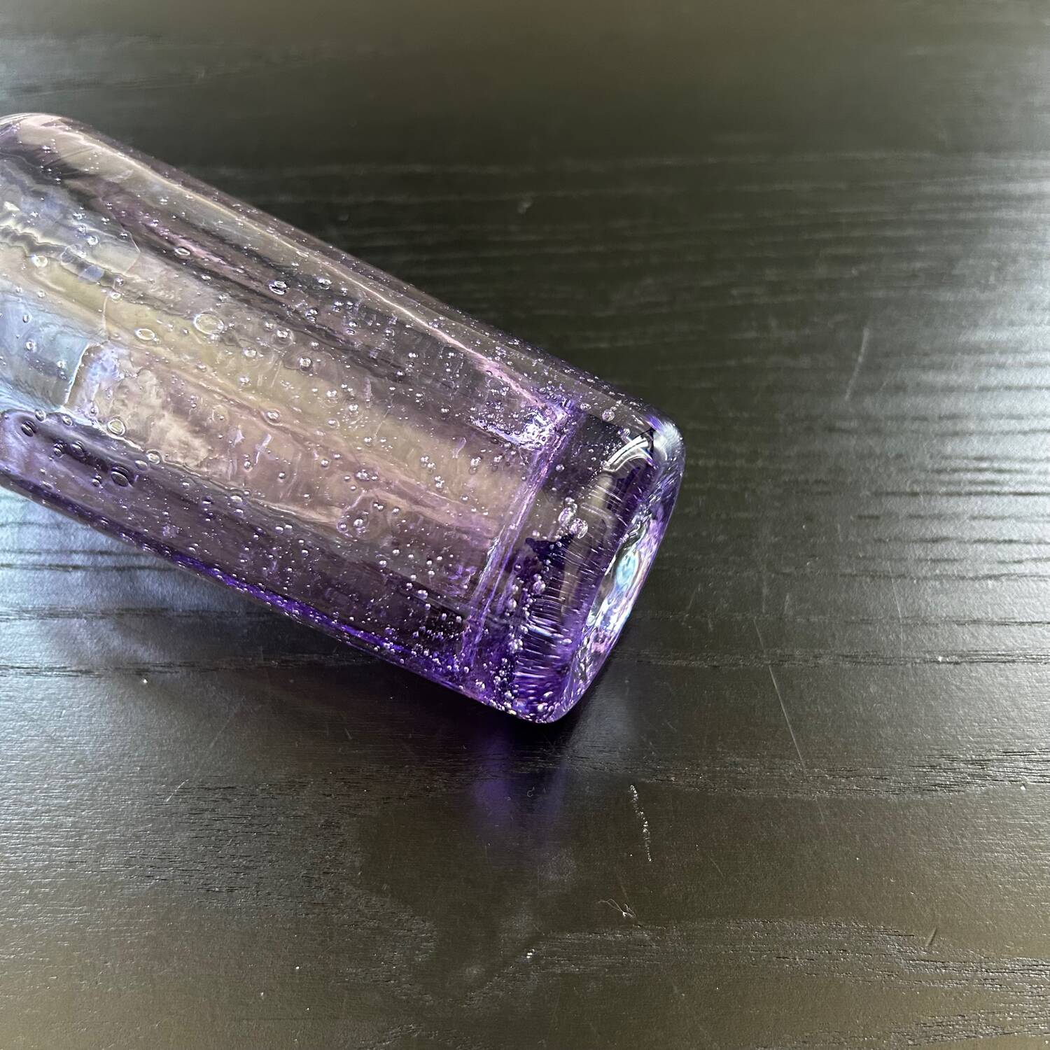 Biot glass in purple glass