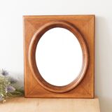 Oval mirror with rectangular oak frame