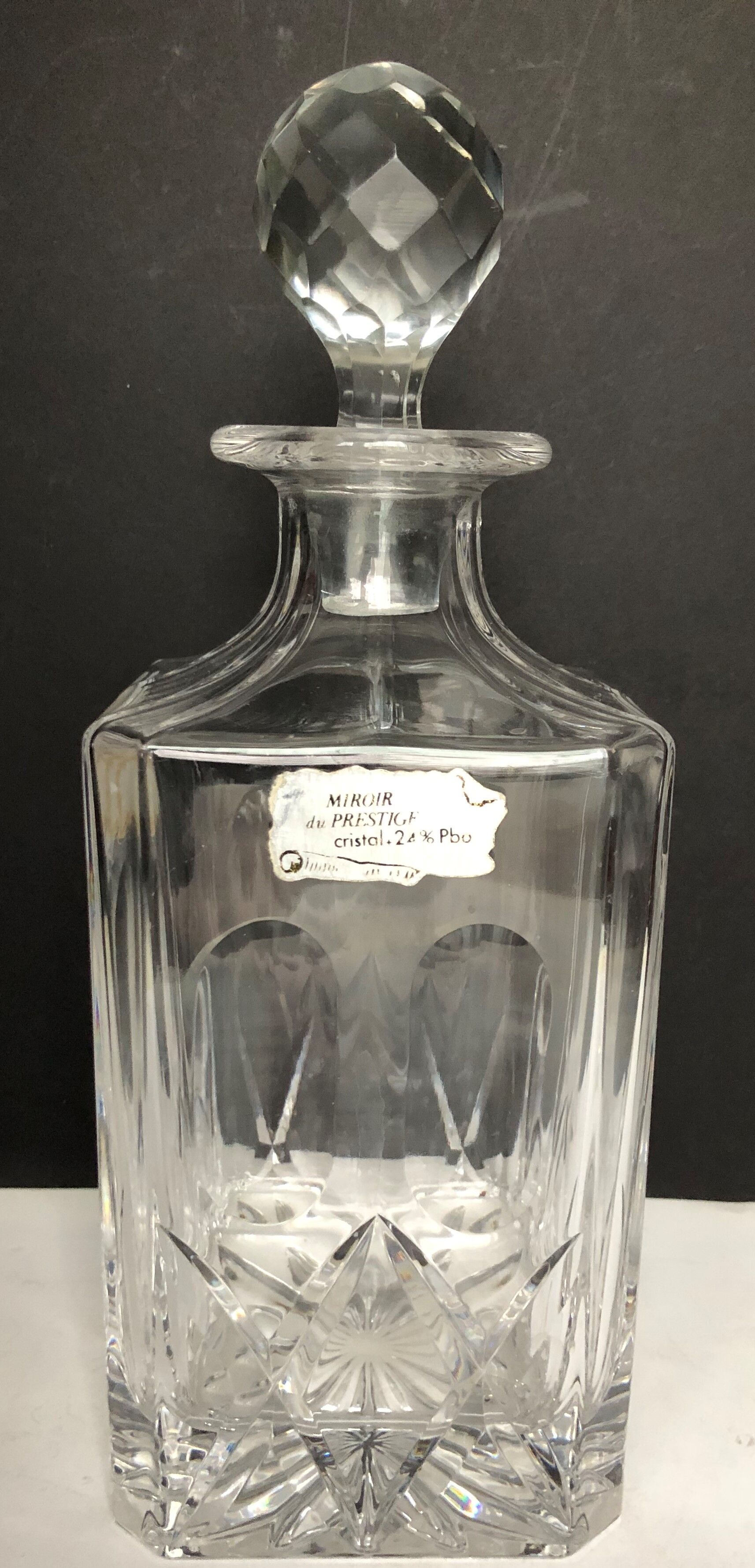 Carved crystal decanter