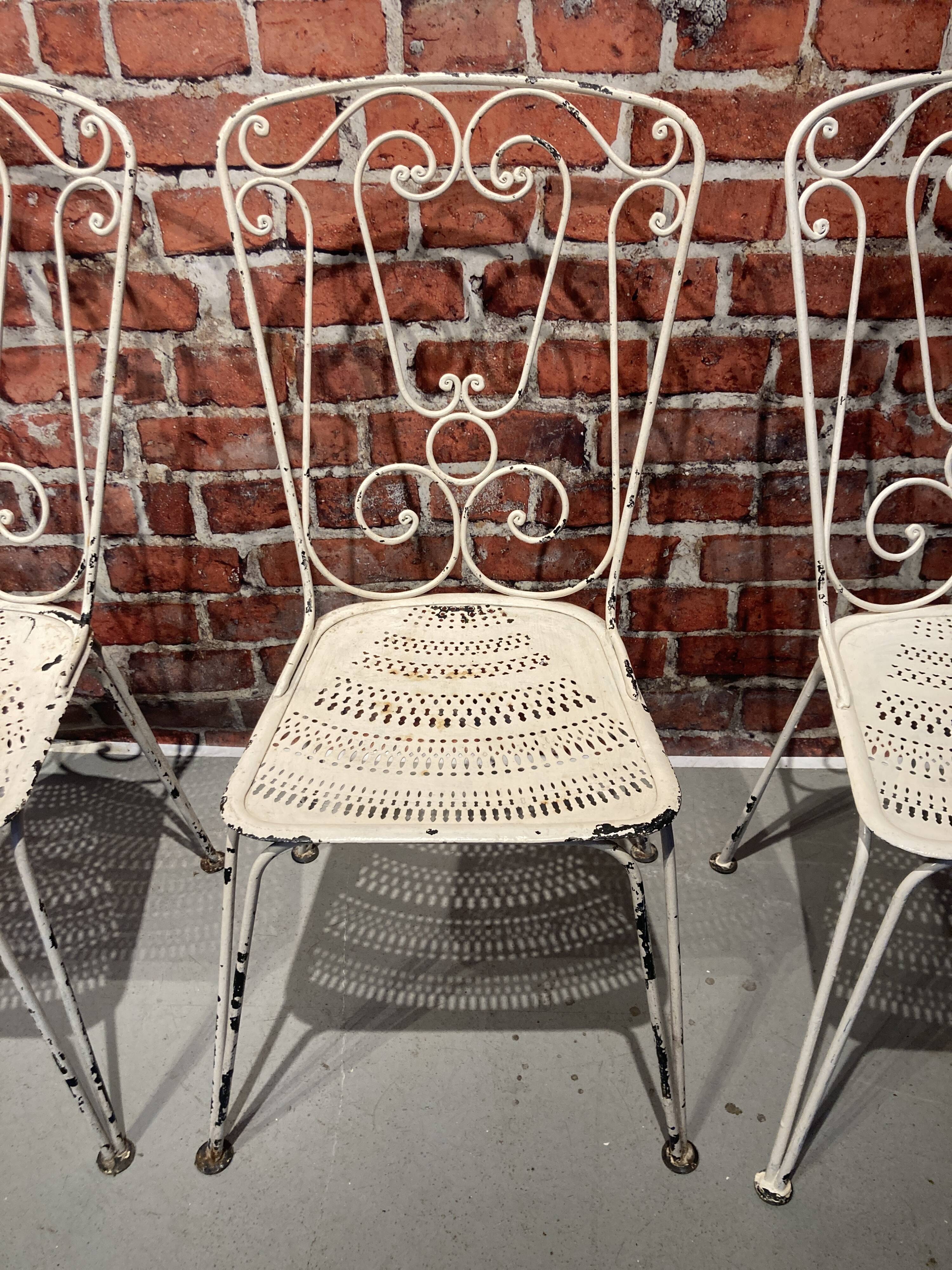 Wrought iron garden set painted white