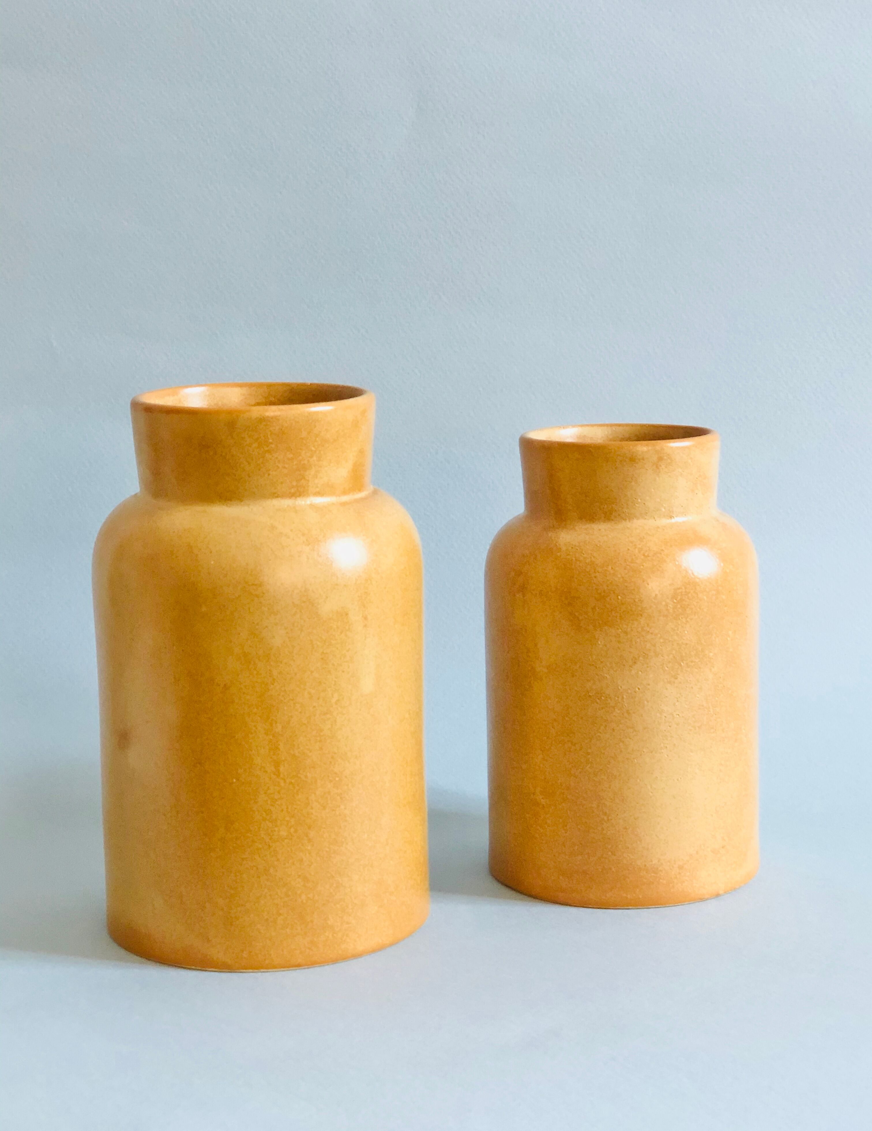 Pair of sandstone pots
