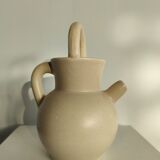Pitcher ball in sandstone with floral pattern