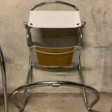 Lot of three vintage tubular armchairs from the 70's