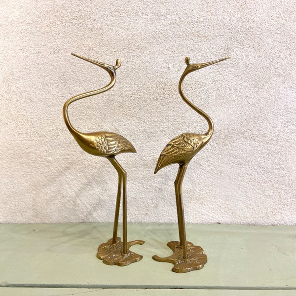 Couple of brass herons