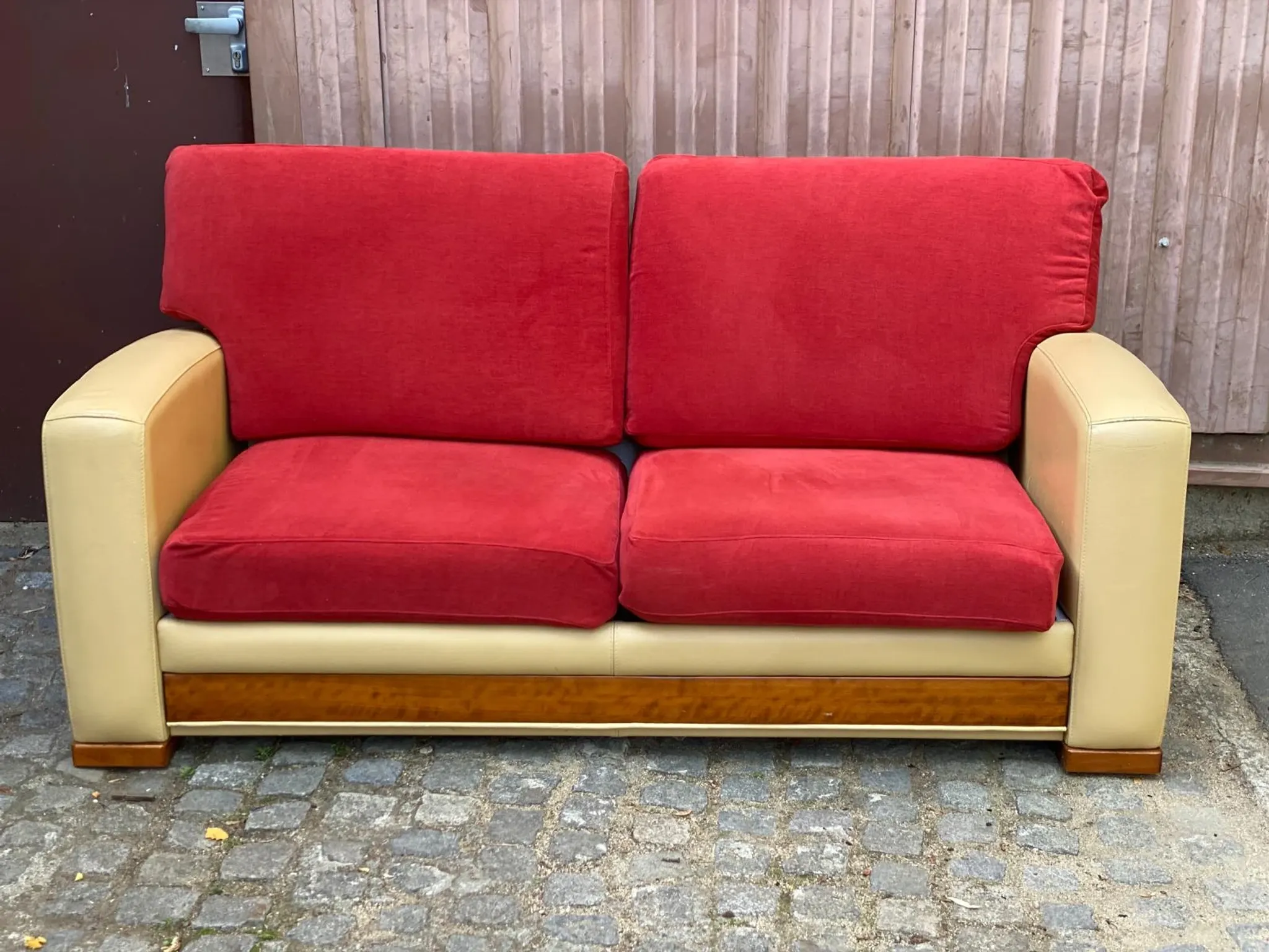 Art Deco 3-seater convertible sofa in genuine beige leather and red fabric from the 1980s.