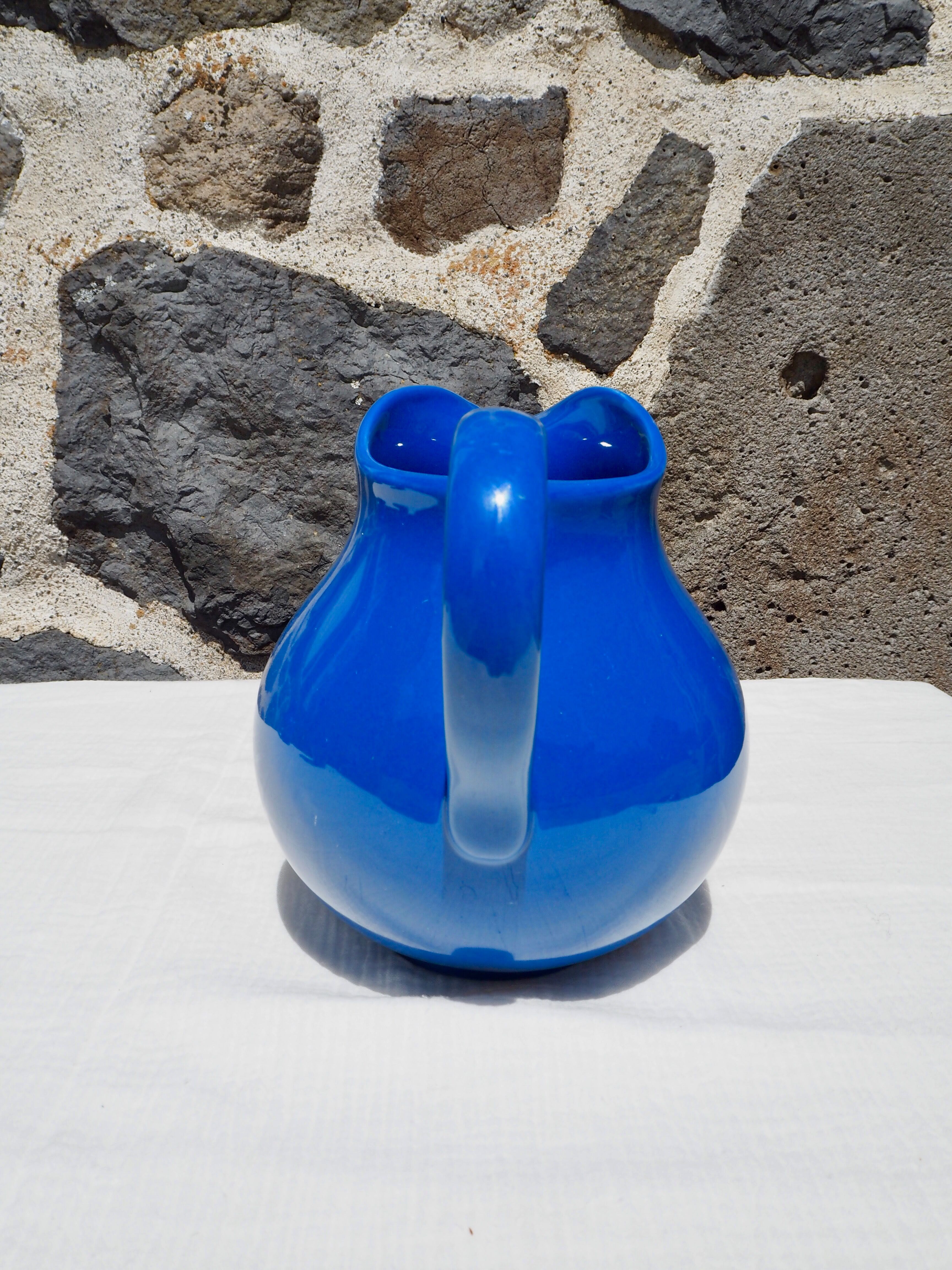 Blue ceramic belly pitcher