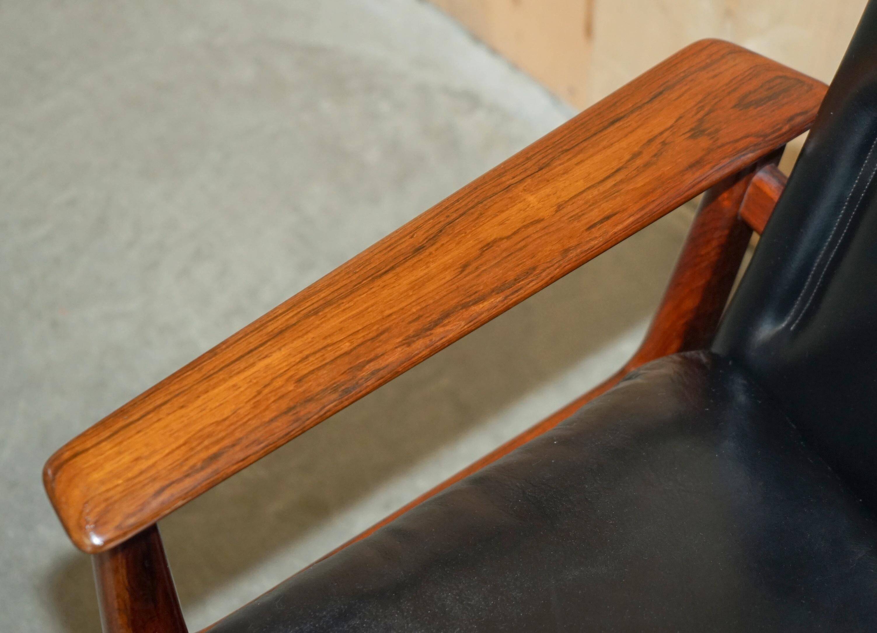 Executive office chair model 419 Arne Vodder for Sibast in hardwood and leather.