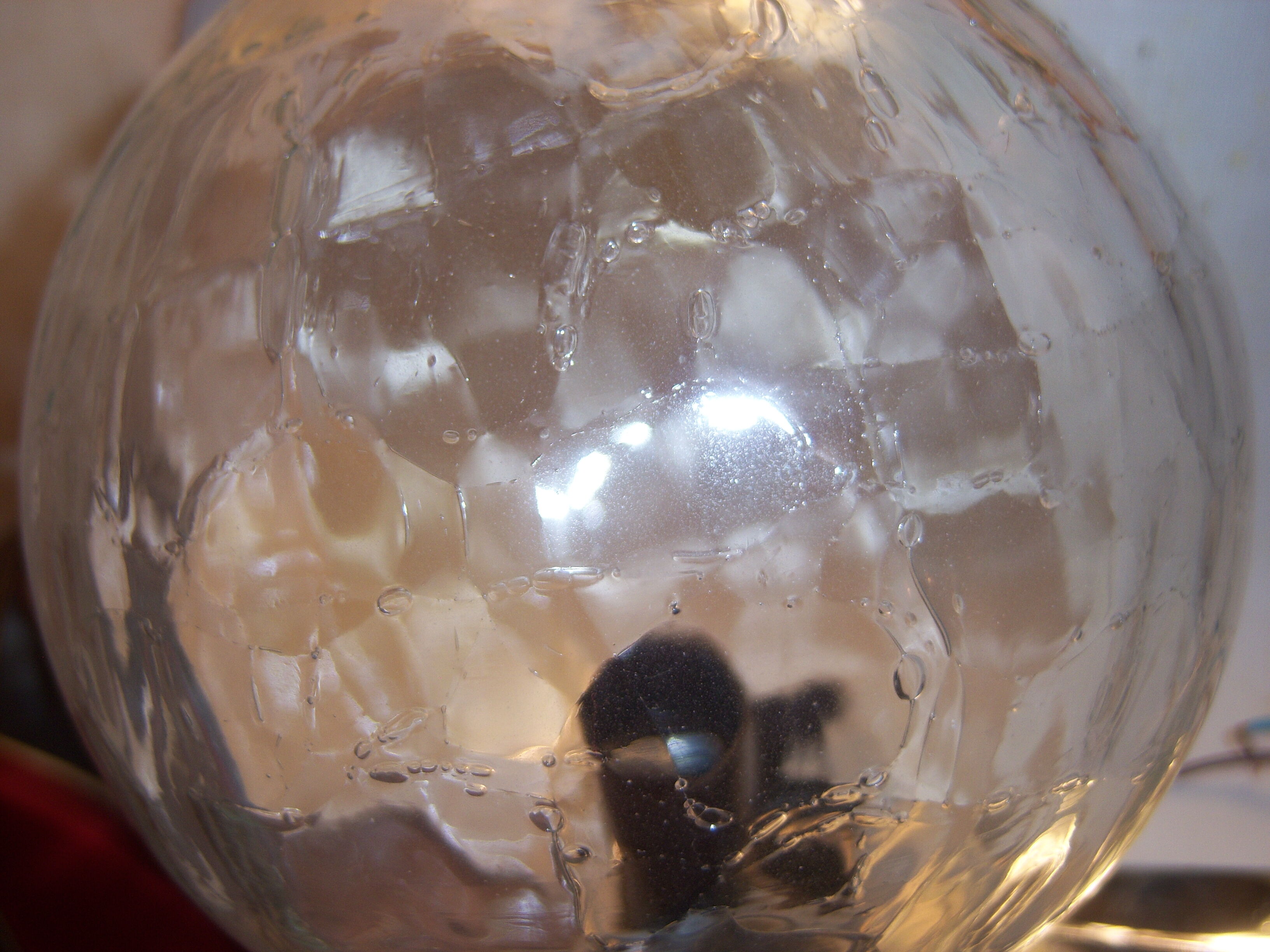 Glass and chrome wall light