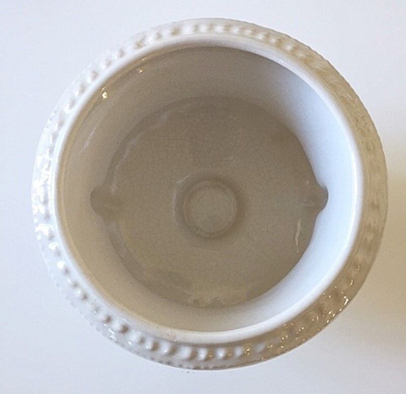 Vintage pot cover in white earthenware