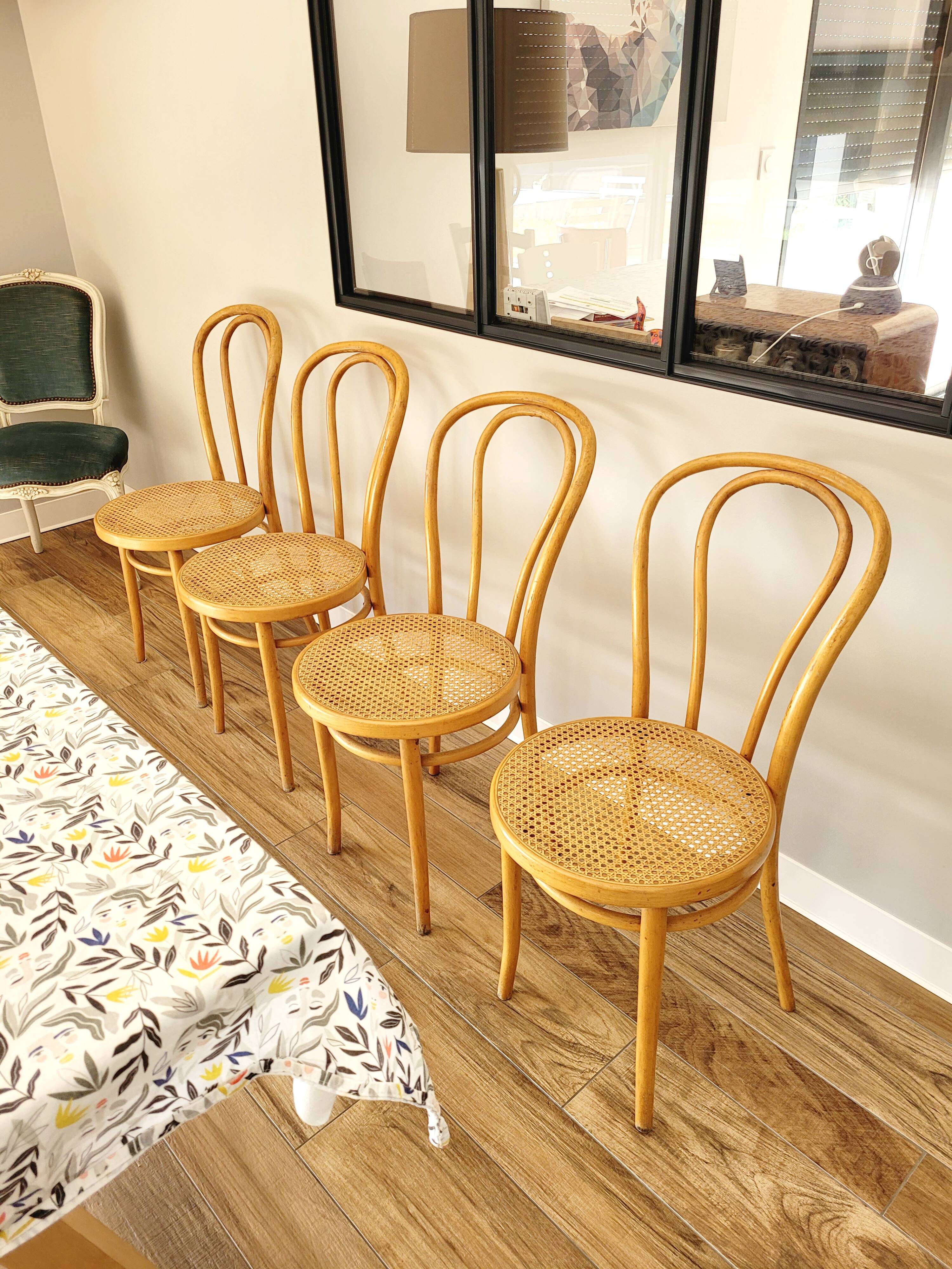 Four cane bistro chairs