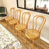 Four cane bistro chairs