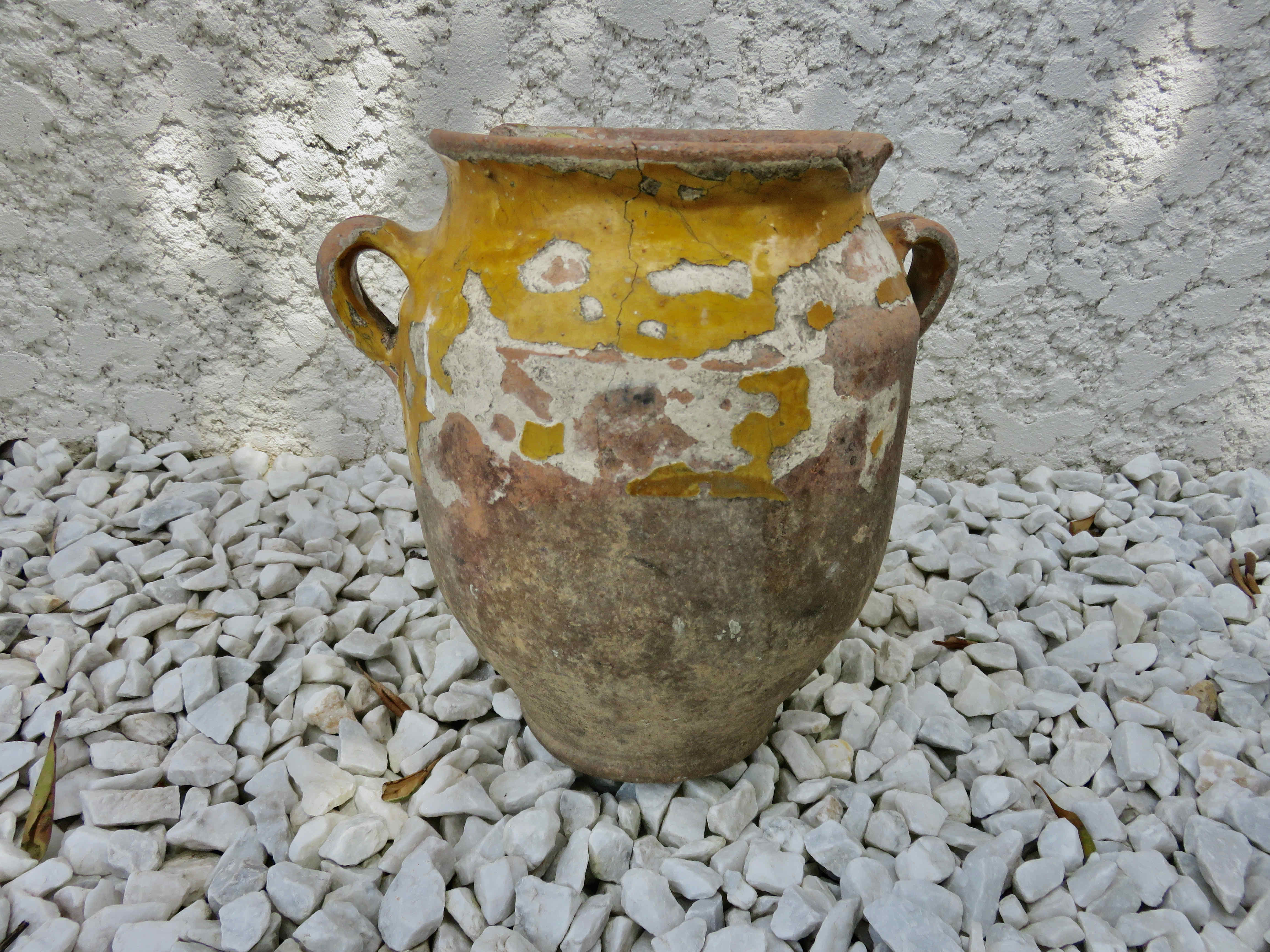 Old candied pot in yellow glazed terracotta XIX century