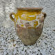 Old candied pot in yellow glazed terracotta XIX century