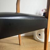 Vintage chair in wood and black leatherette