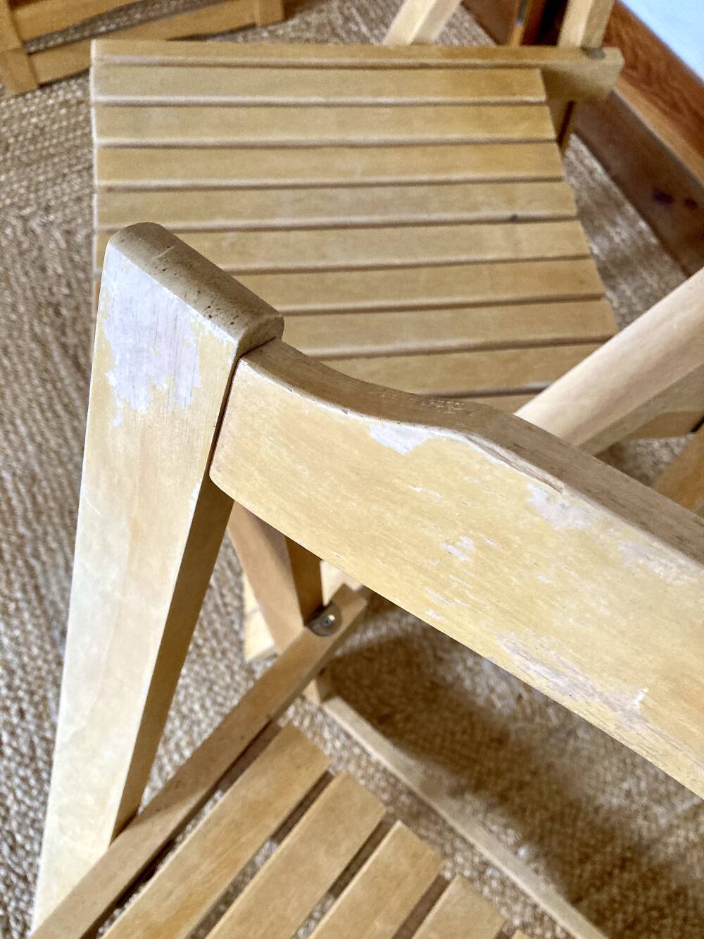 Folding chairs designed by Aldo Jacober in solid beech wood.