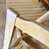 Folding chairs designed by Aldo Jacober in solid beech wood.