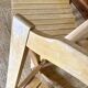 Folding chairs designed by Aldo Jacober in solid beech wood.