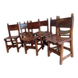 Set of 8 walnut and leather chairs from the 1950s