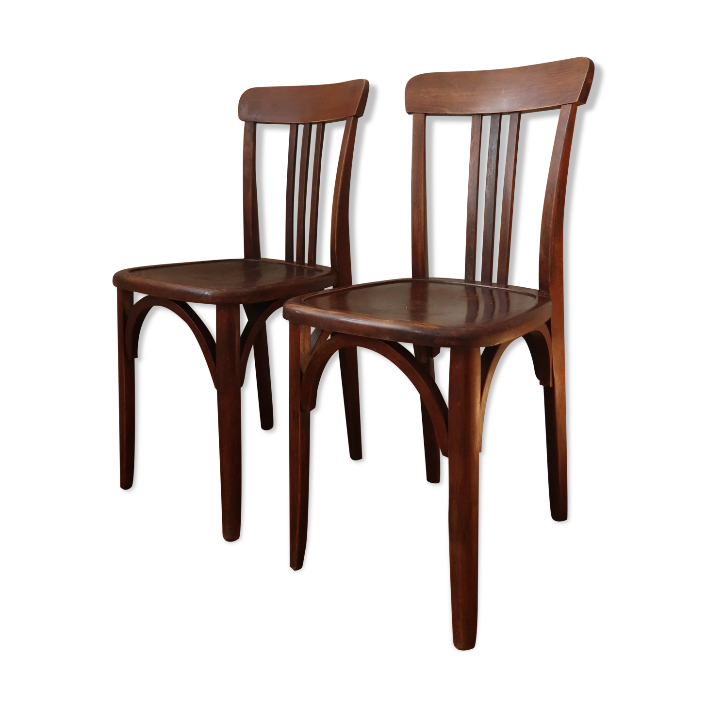 Pair of patinated bistro chairs