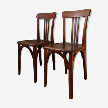 Pair of patinated bistro chairs