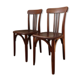 Pair of patinated bistro chairs