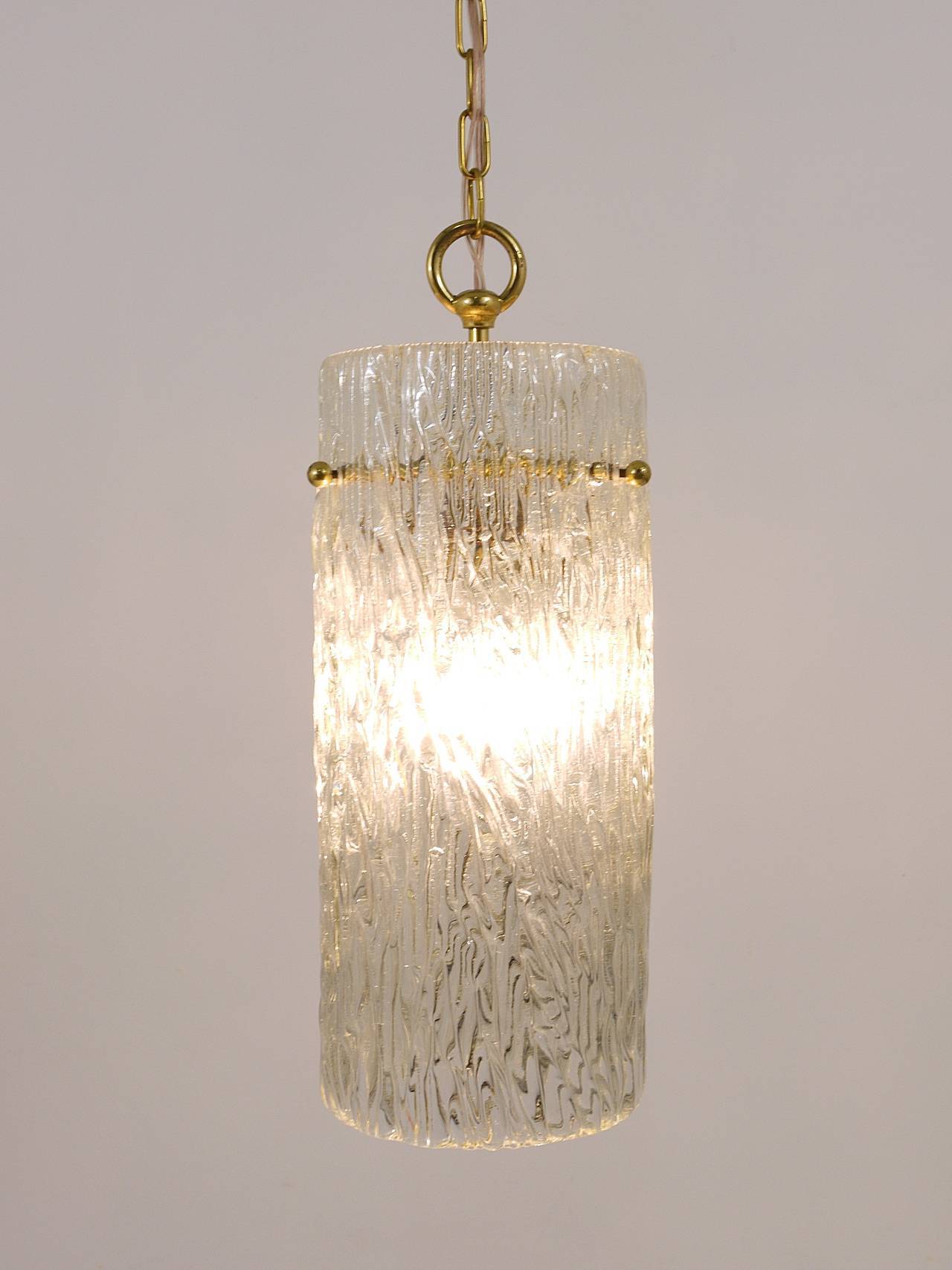 Two suspended lamps in glass and brass by J.T. Kalmar, Vienna, mid-century, Austria, 1950s.