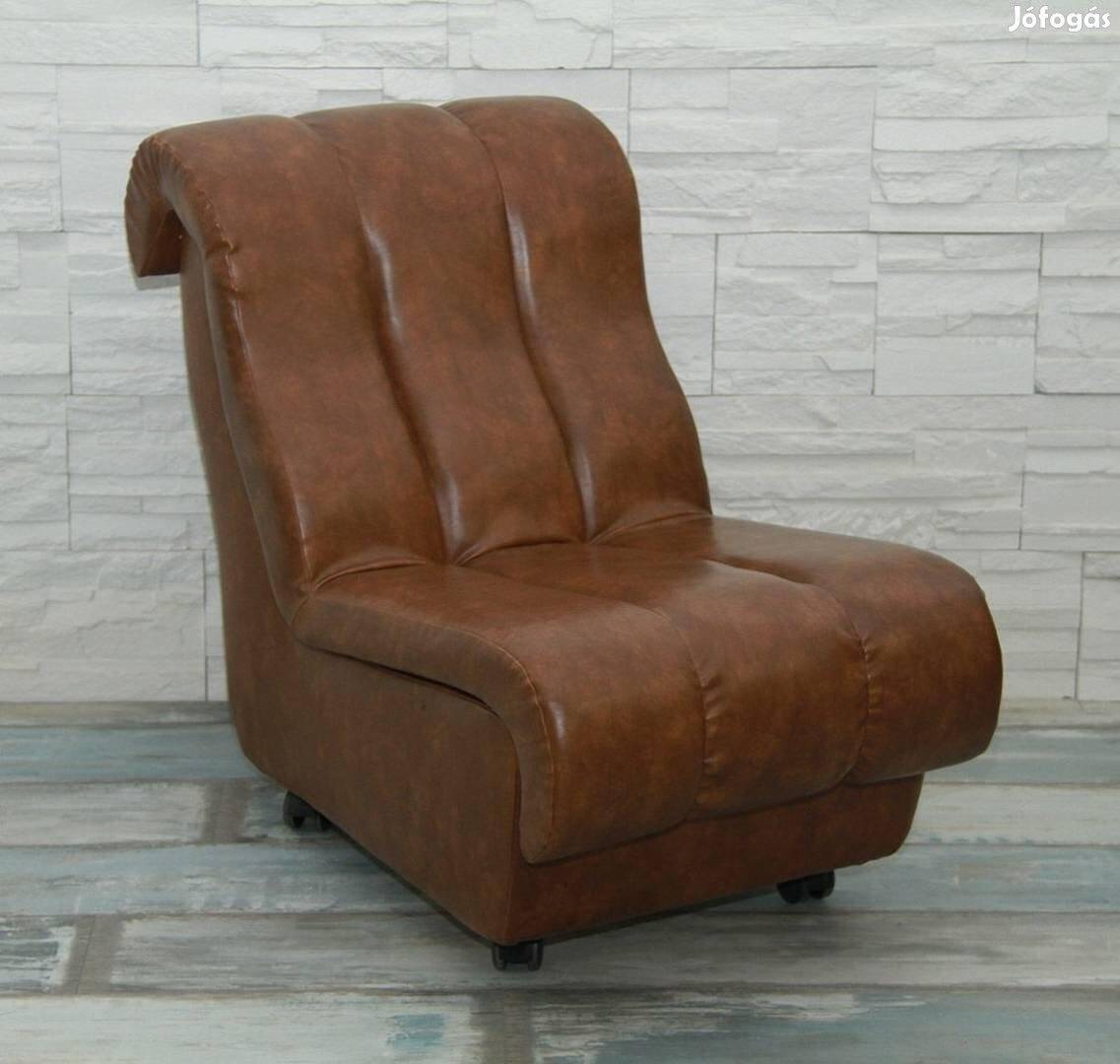 Mid-Century brown leather armchair, ribbed monobloc from the 1960s.