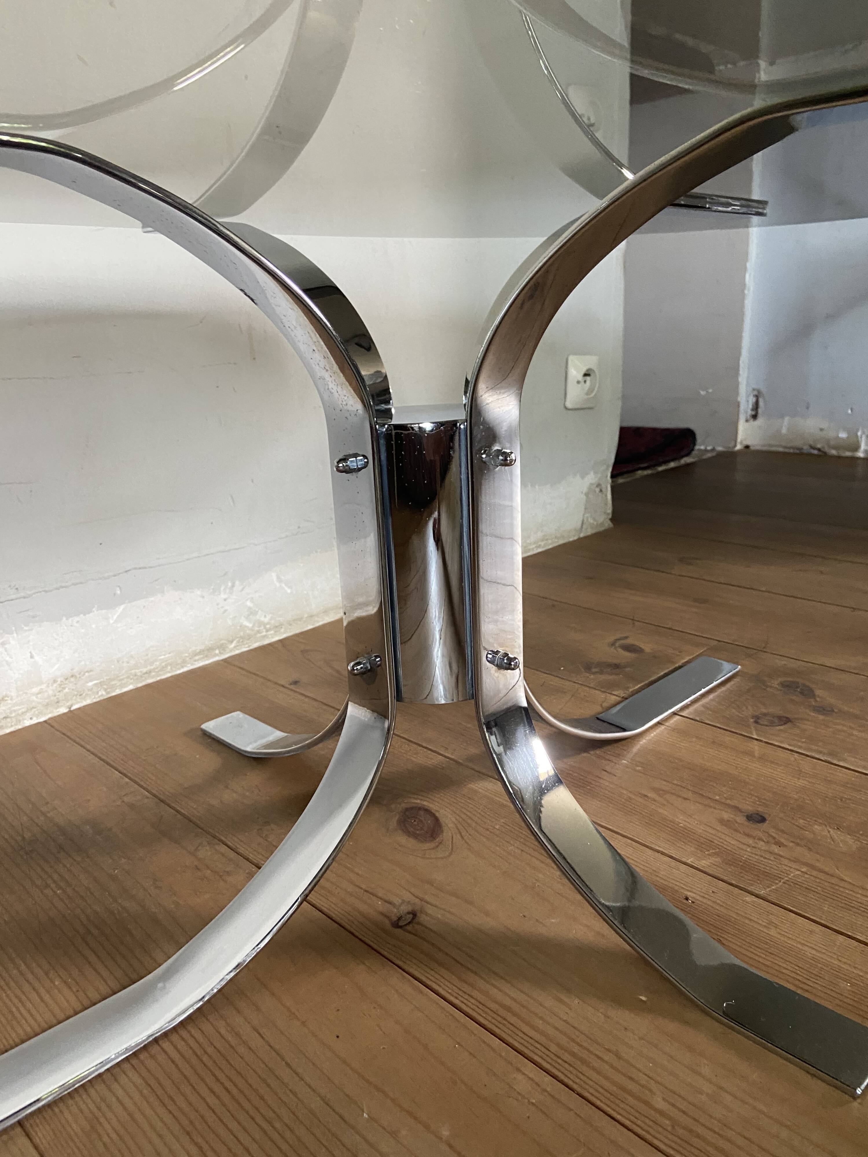 Modernist chrome and smoked glass table with tulip base from the 70s
