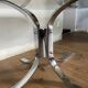 Modernist chrome and smoked glass table with tulip base from the 70s