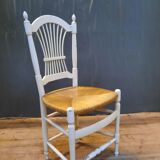 Series of 4 white straw chairs countryside