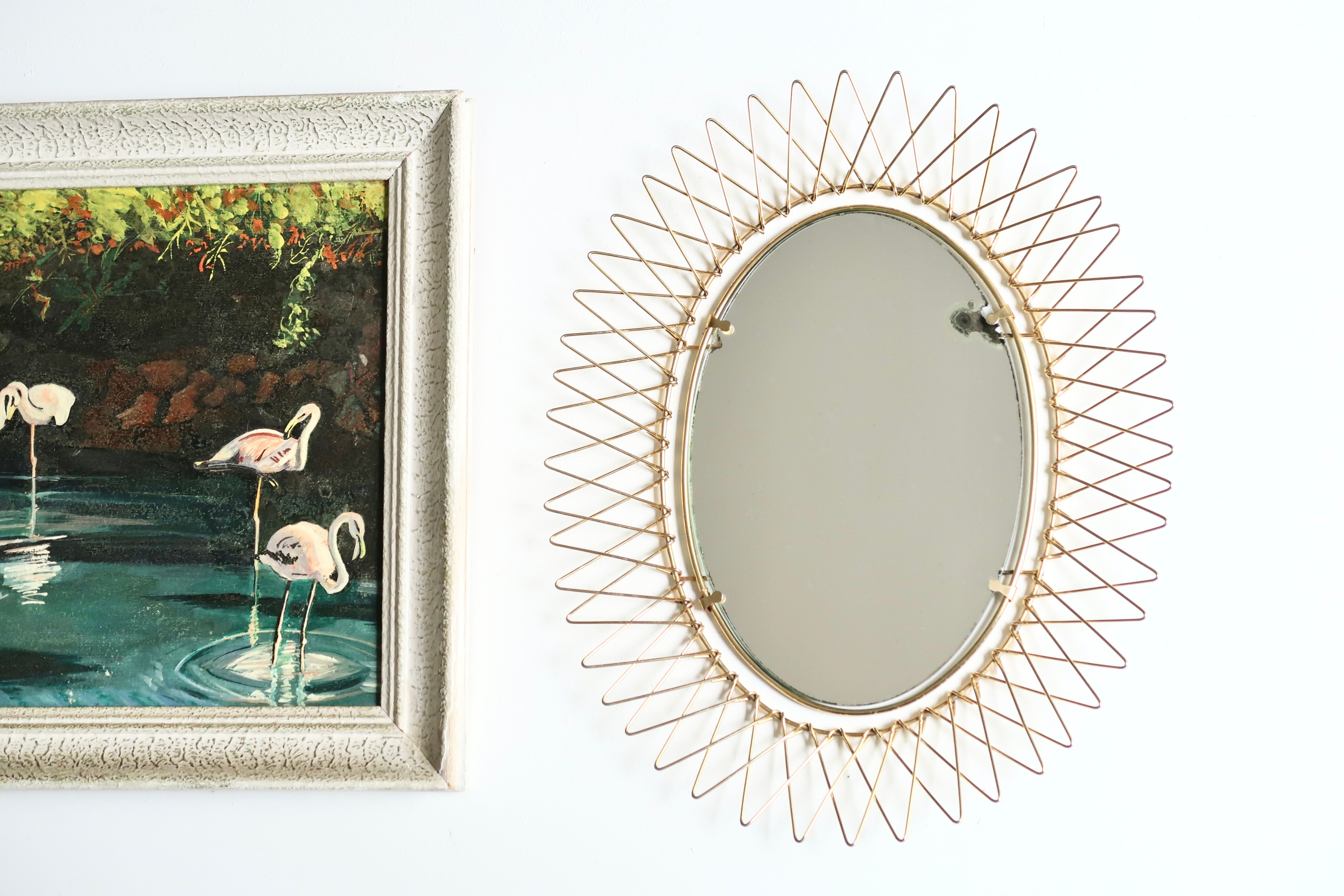 Oval golden sun mirror in metal, 1960s