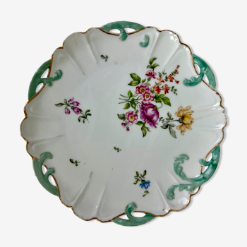 Scalloped plate with floral motif and blue circumference