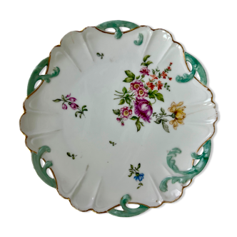 Scalloped plate with floral motif and blue circumference