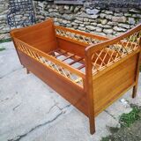 Wooden and rattan child bed