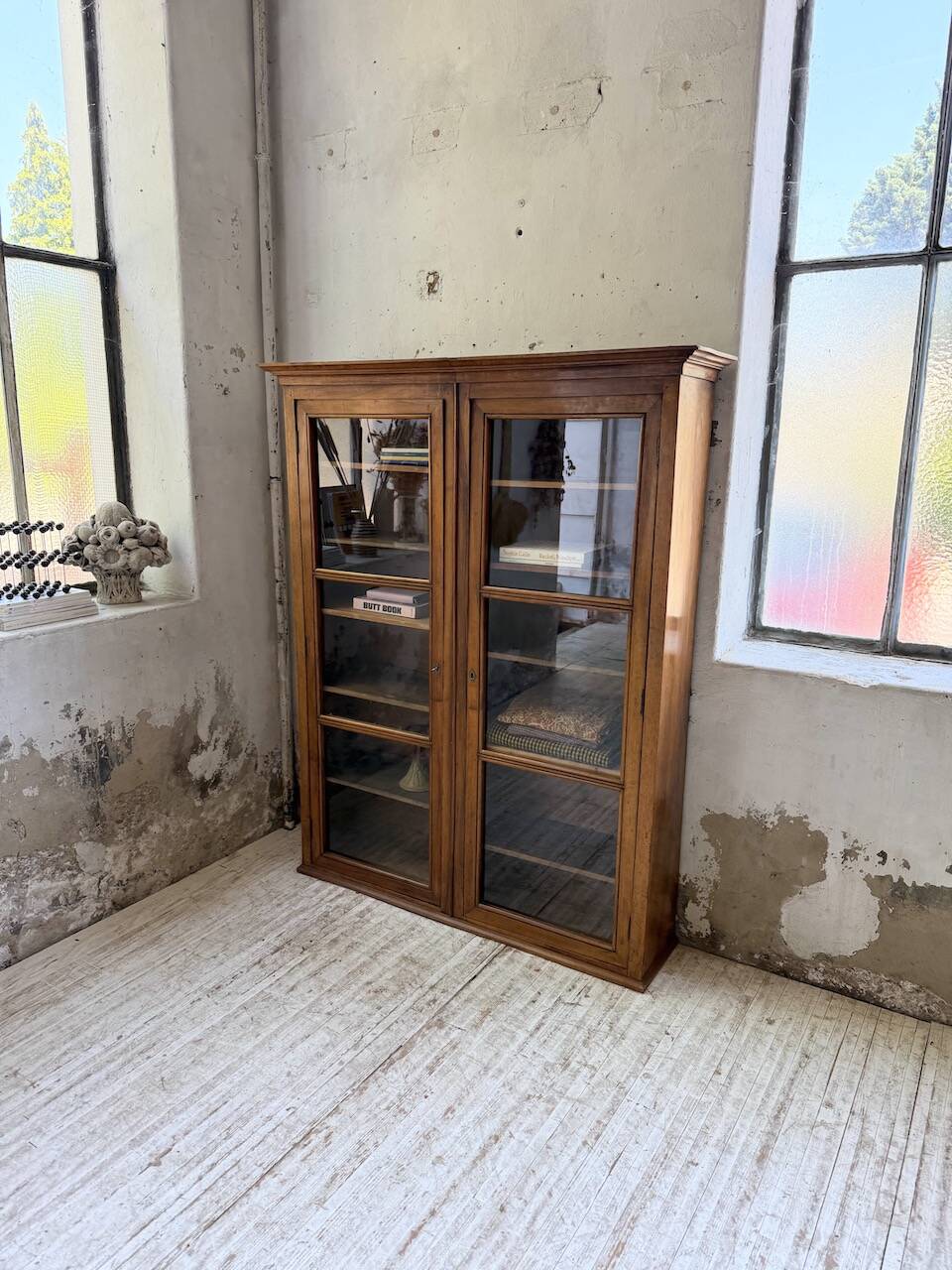 Glass-fronted walnut library 1900