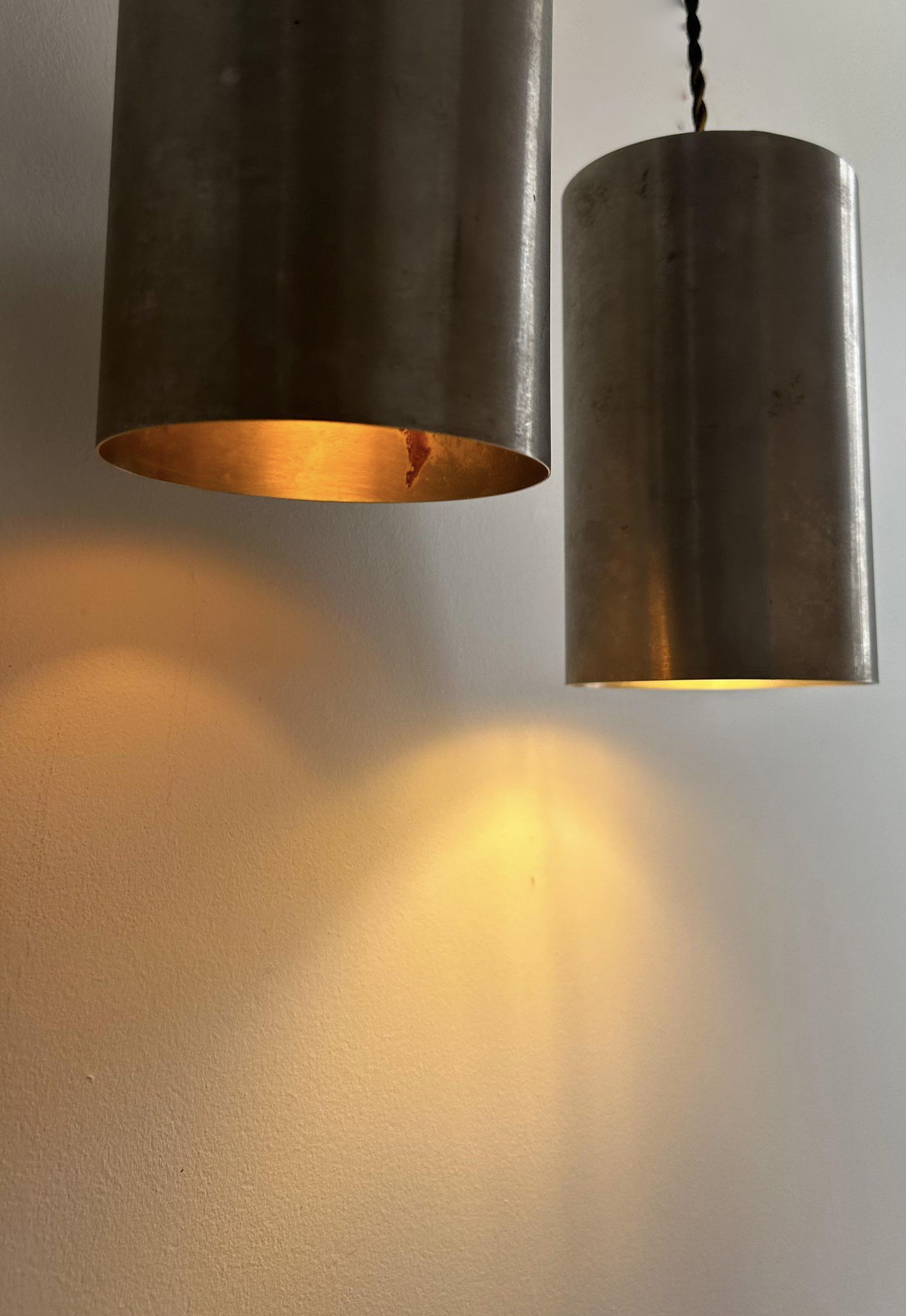 Pair of vintage brushed metal pendant lamps, France 1960