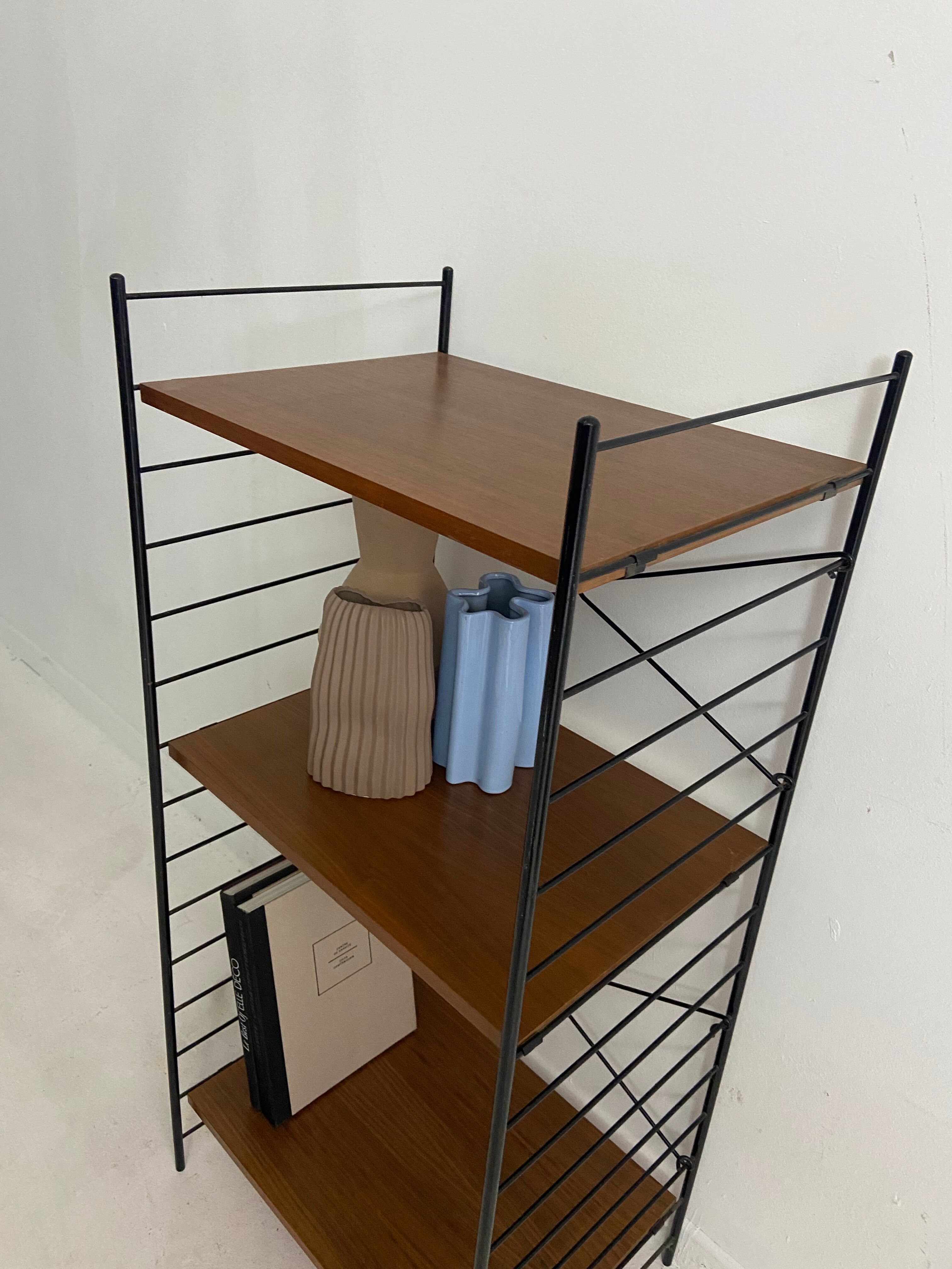 small vintage metal and teak string bookshelf