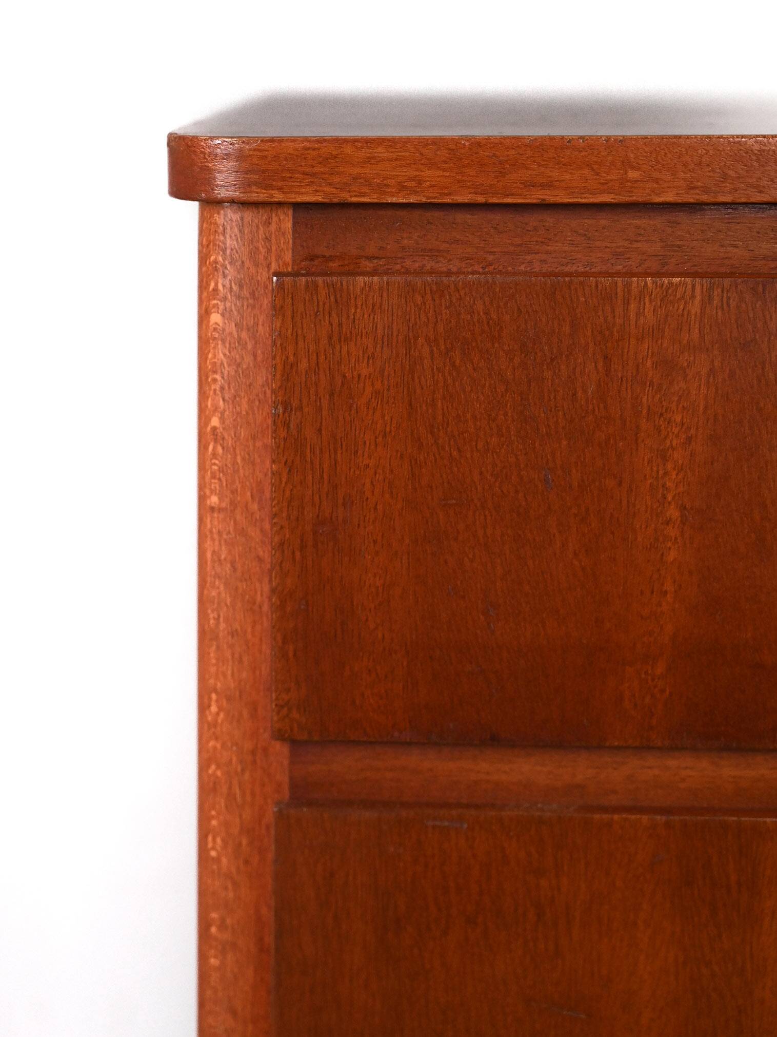 Mahogany chest of drawers with metal handles