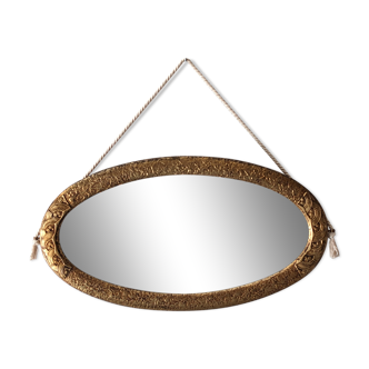 Art deco oval mirror in gilded wood 70x38 cm