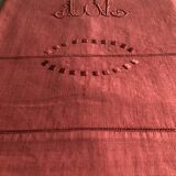 Old linen and cotton sheet in brick red