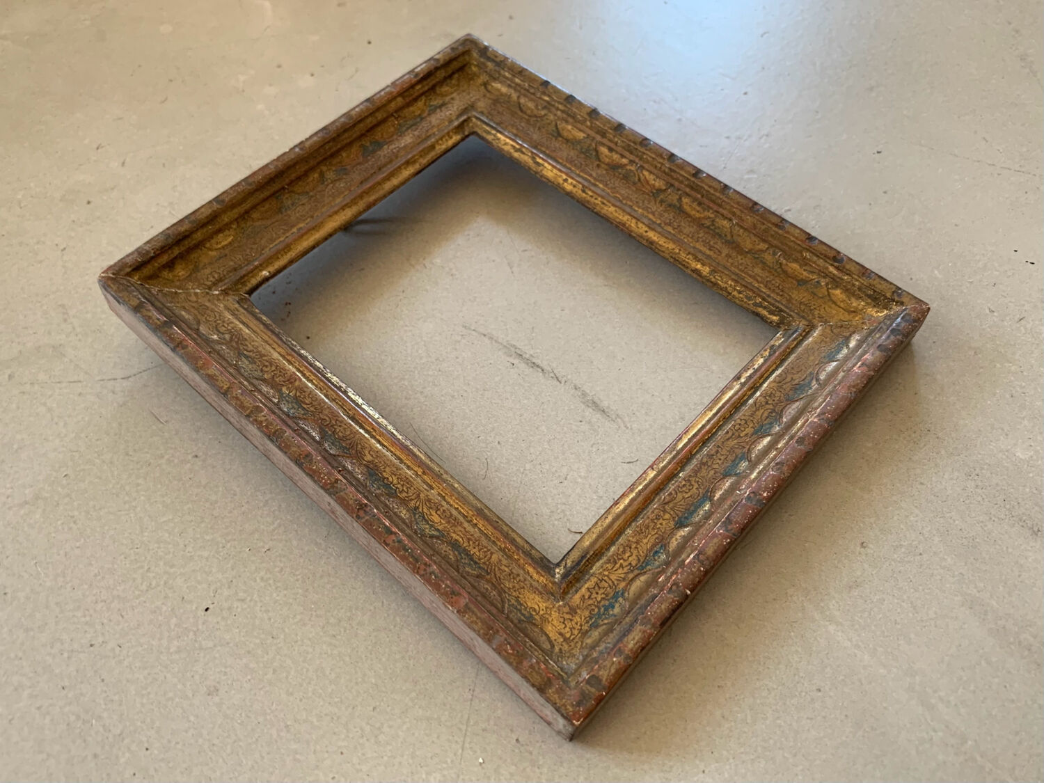Small old oriental golden frame