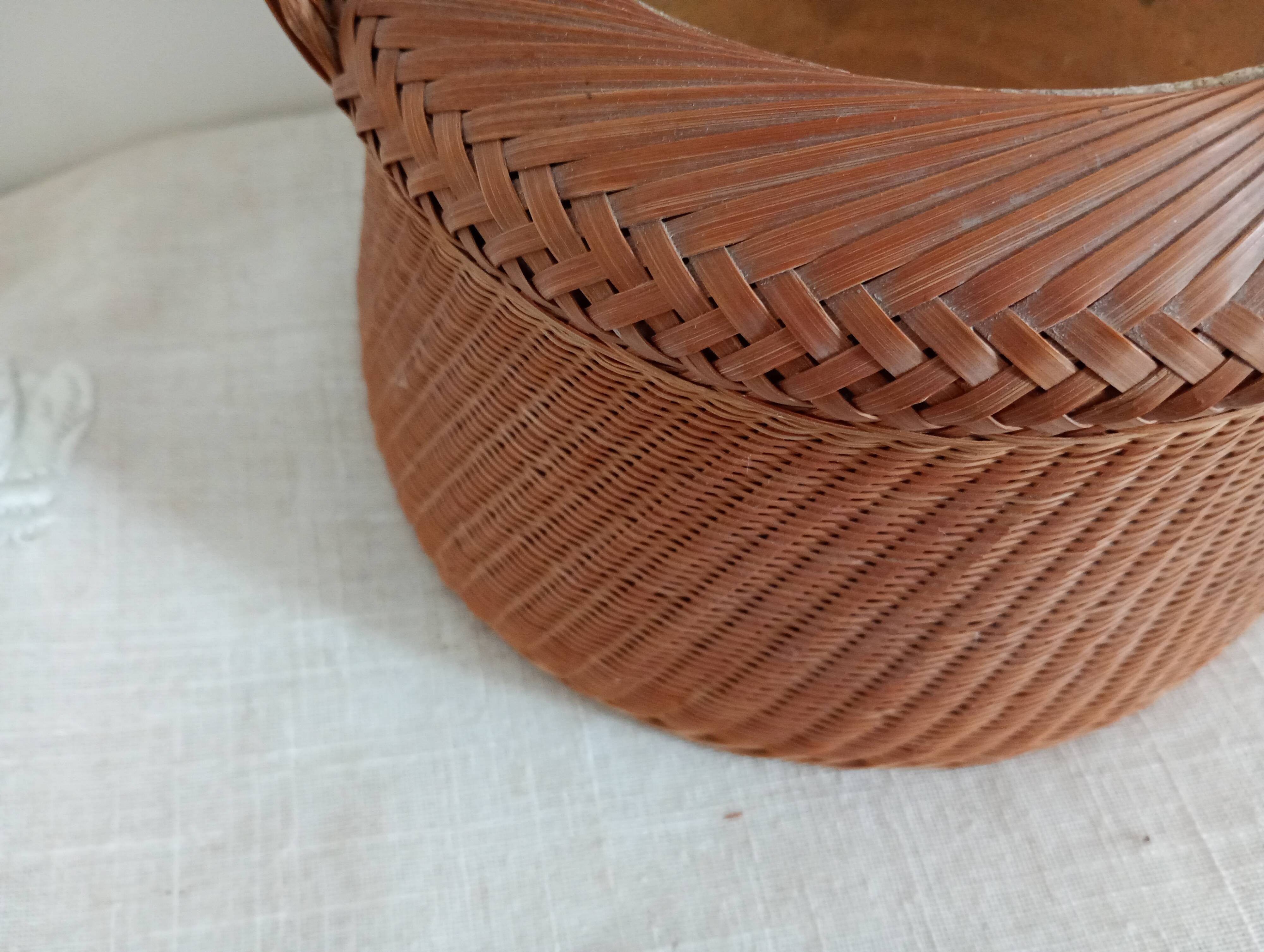 Woven bamboo basket and ceramic. Philippines.
