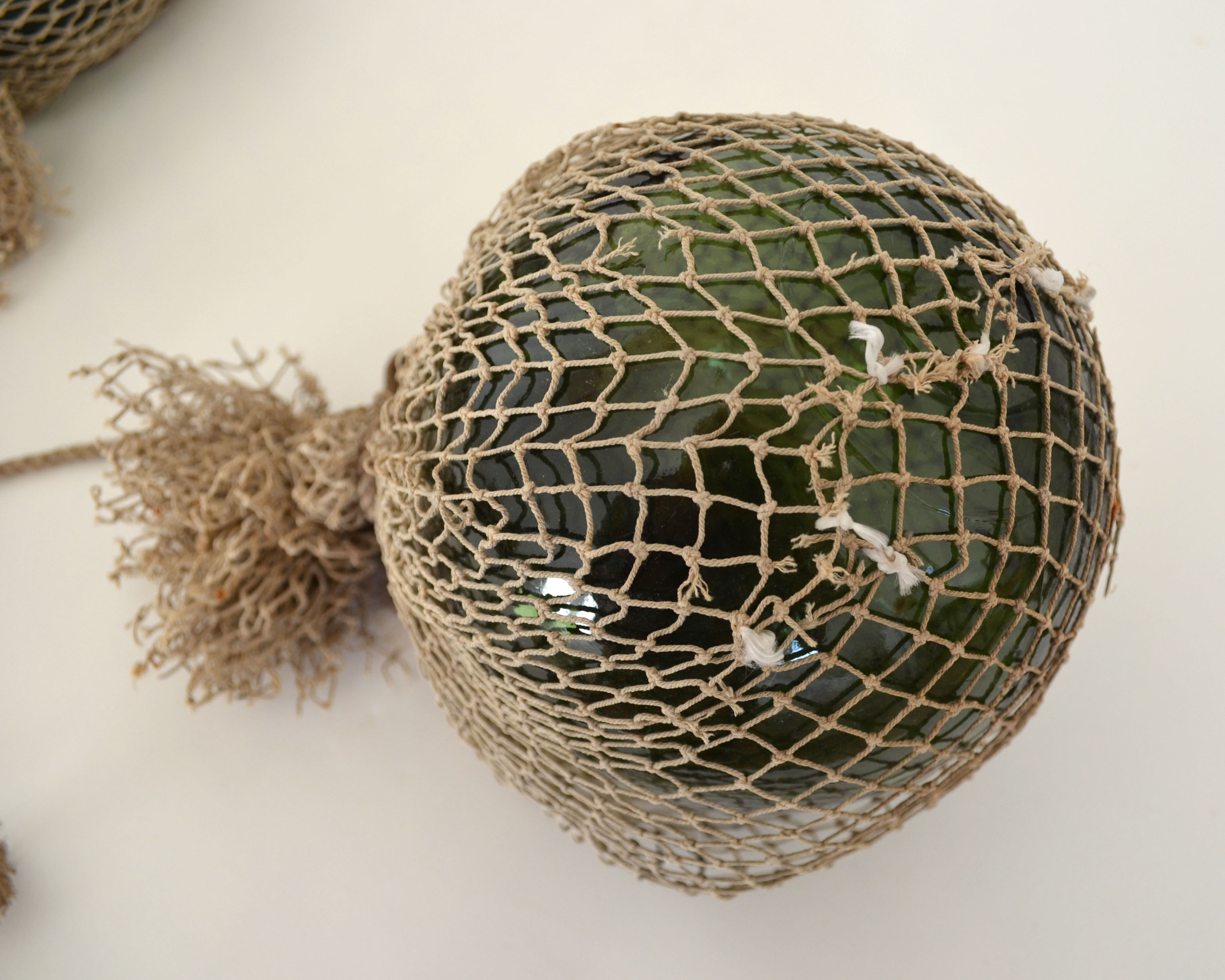 Two old glass floats