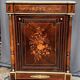 Elegant Napoleon III style commode with fine marquetry, gilded bronze mounts, and a marble top.