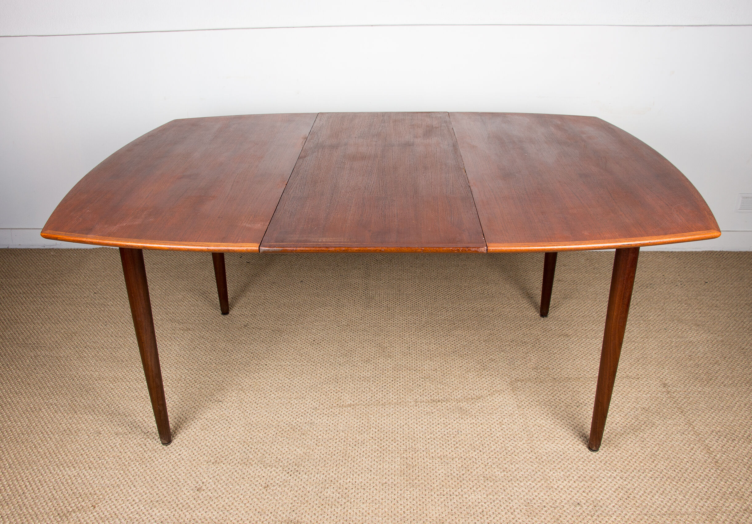 Expandable square teak dining table by Henry Walter Klein 1960