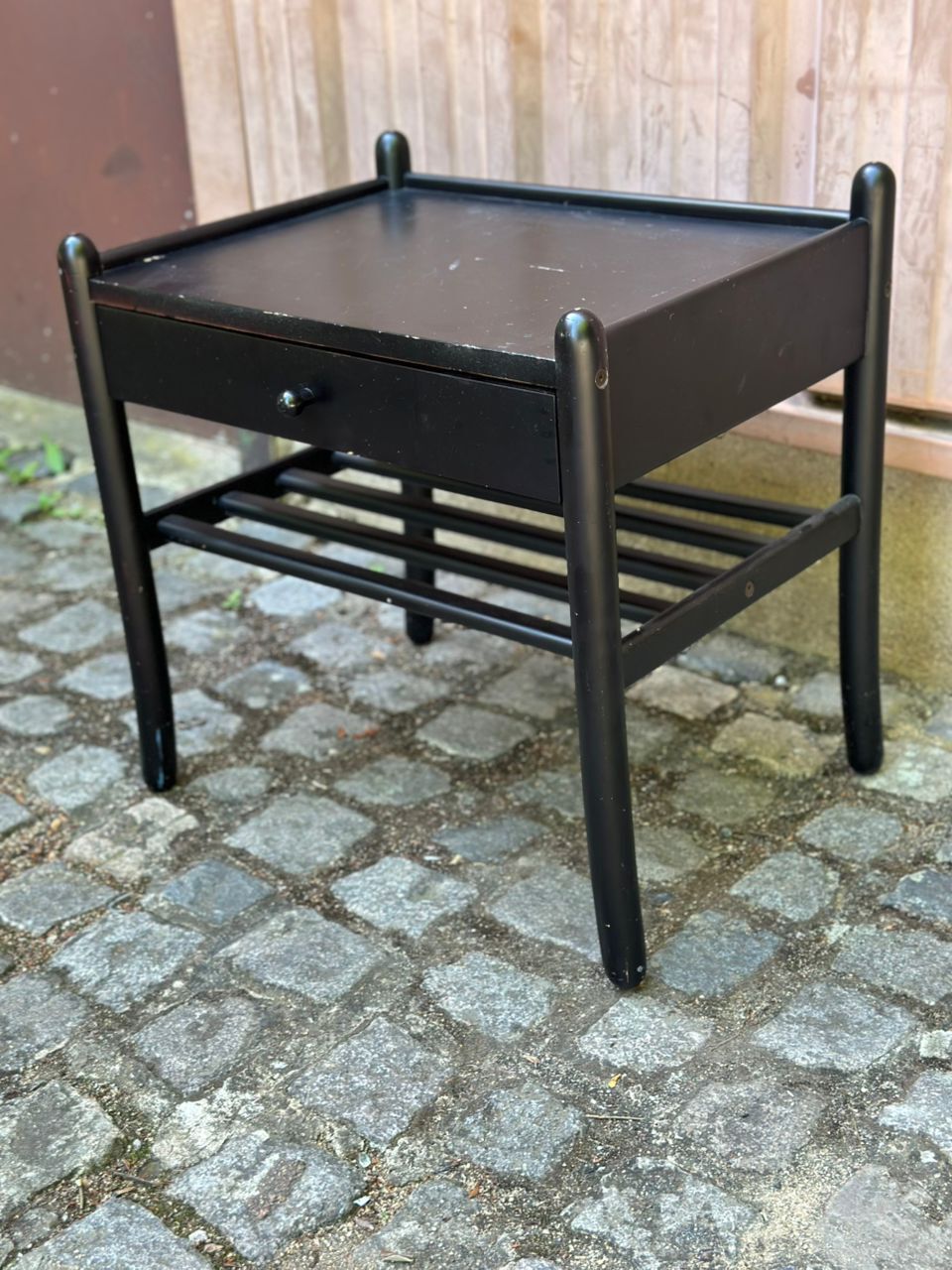 Vintage bedside table from the 1980s in black wood.