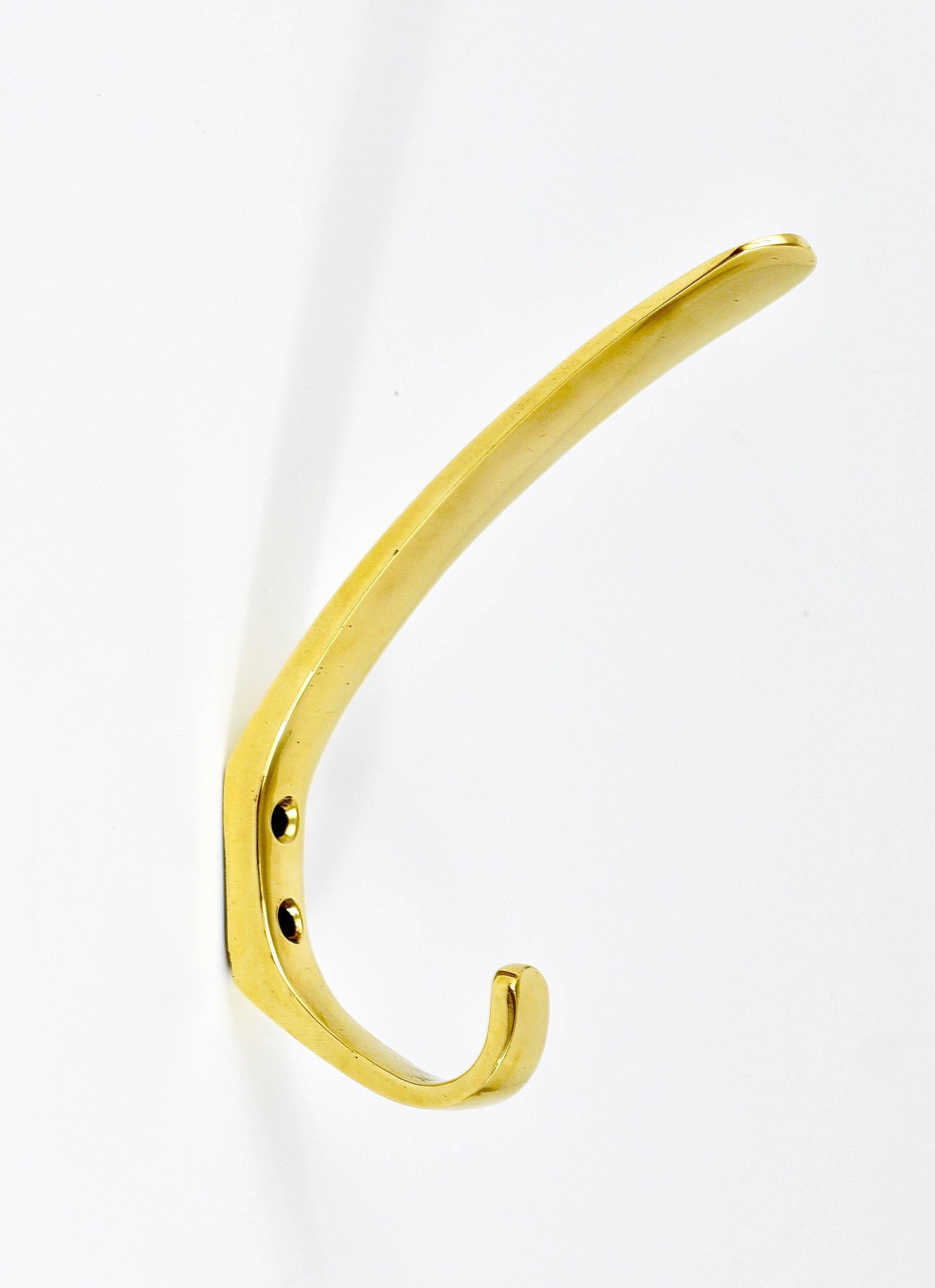 Up to four mid-century brass wall hooks by Herta Baller, Austria, 1950s.