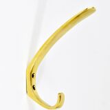 Up to four mid-century brass wall hooks by Herta Baller, Austria, 1950s.