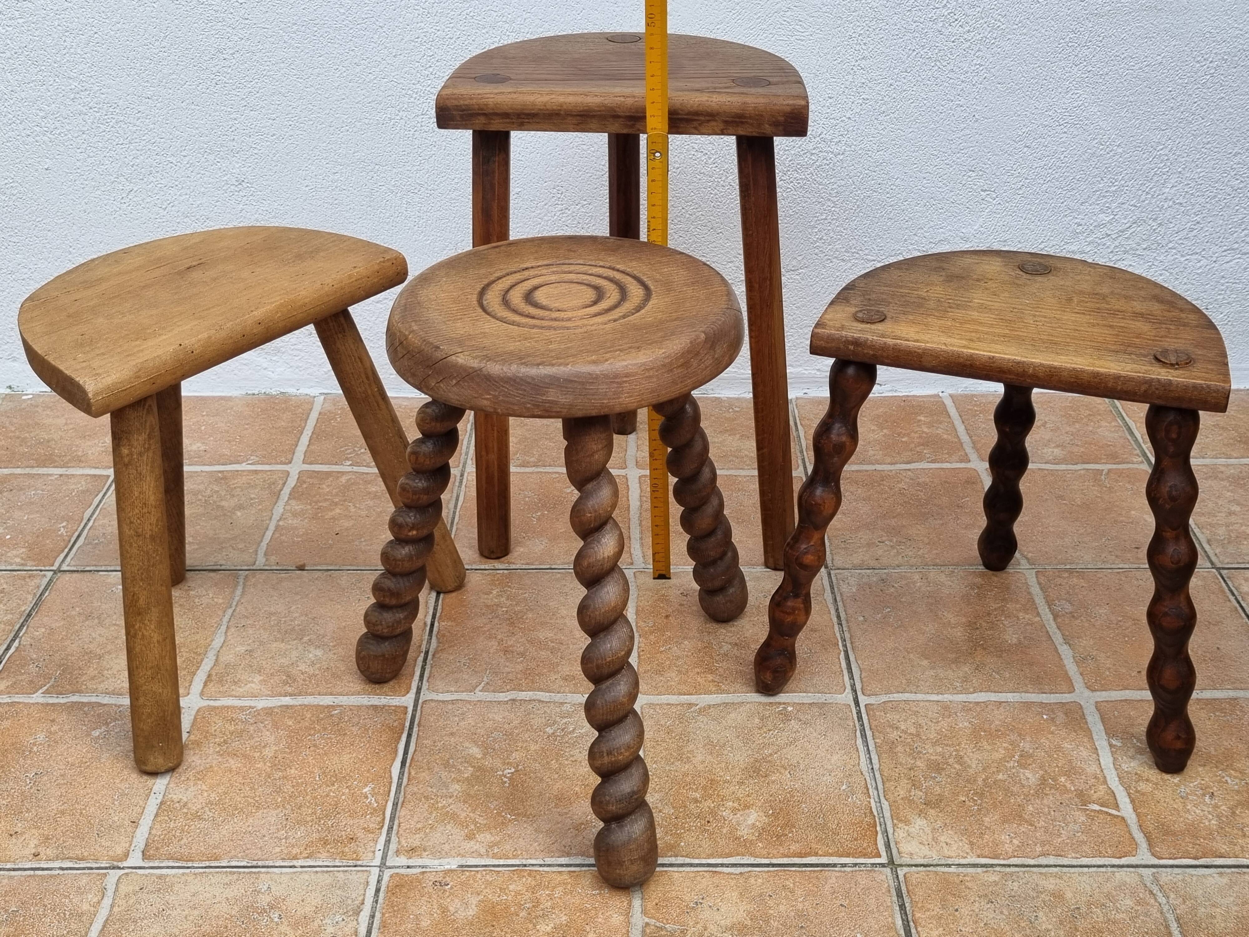 Set of four rustic solid wood plant holders, 31 to 43 cm