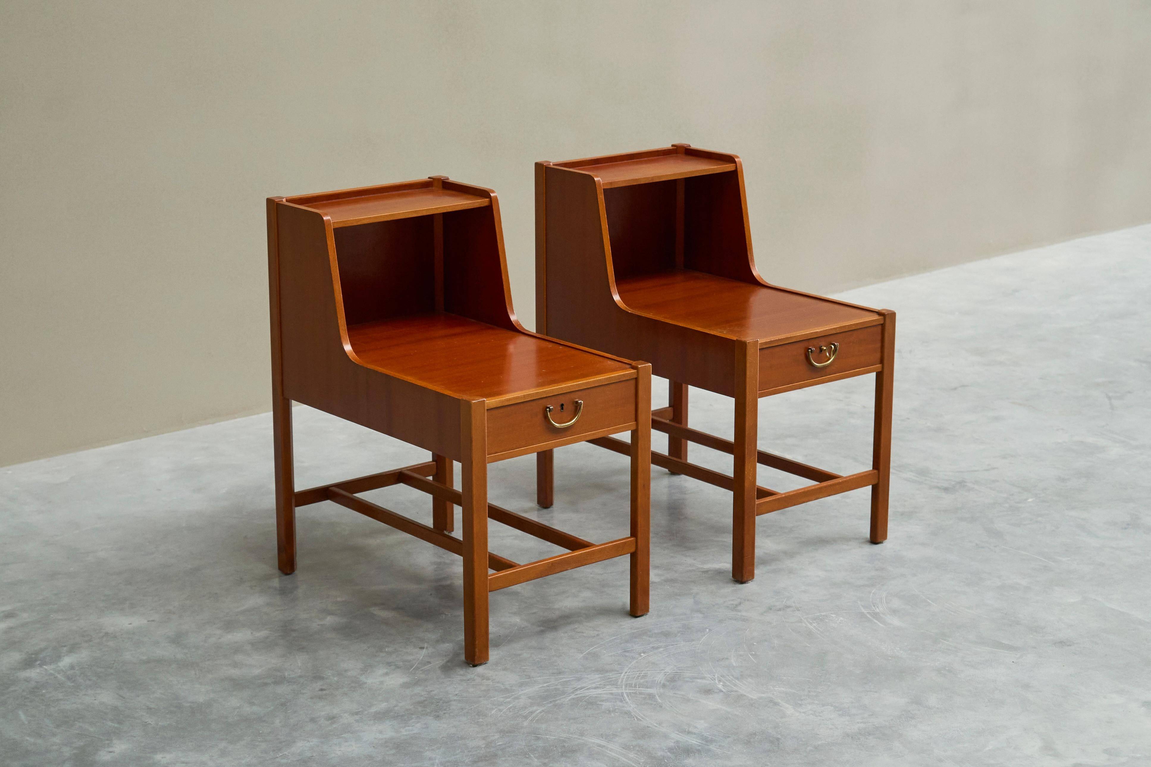 Pair of bedside tables by Nordiska Kompaniet in teak, 1952, by David Rosén.